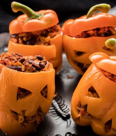 Jack-O’-Lantern Stuffed Peppers